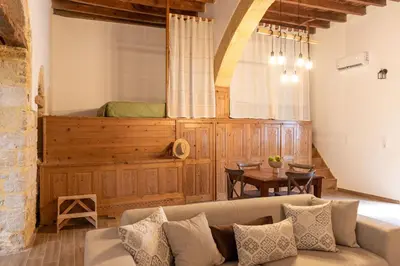 a living room with a couch and a table at La Casa di Varvara e Nikolas in Soroni