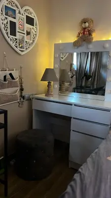 a bedroom with a desk with a mirror and a lamp at Cozy Rhodes Studio in Rhodes Town