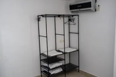 a towel rack in a room with towels at Ismini Basement Retreat in vlicha