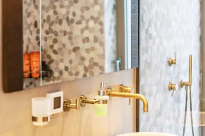 a bathroom with a sink and a mirror at Mythica Luxury Villa in Yennadhion