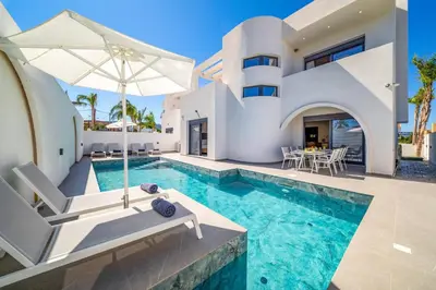 an image of a villa with a swimming pool at Villa Askim Evelia by Villa Plus in Ialyssos