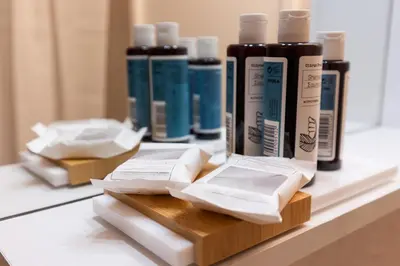 a counter with four bottles of hair products on it at Residence City Cozy Nest in Rhodes Town