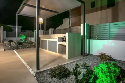 a kitchen with a sink and a counter at Kiki Luxury Villa in Afantou