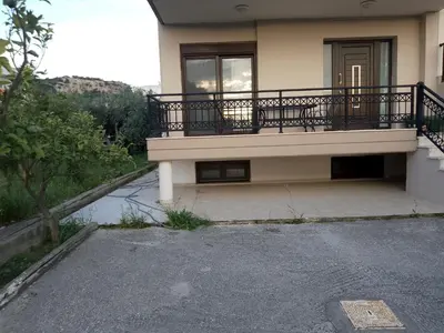 a house with a balcony on the side of it at Grande casa di Ialysos in Ixia