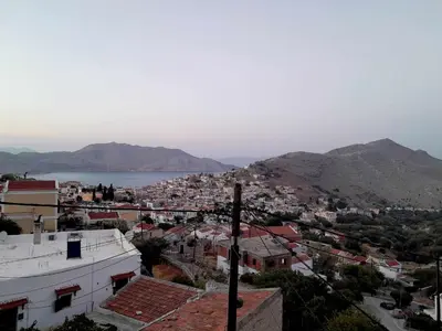 a view of a city from the roof of a building at Sevasti Symi Studios in Symi