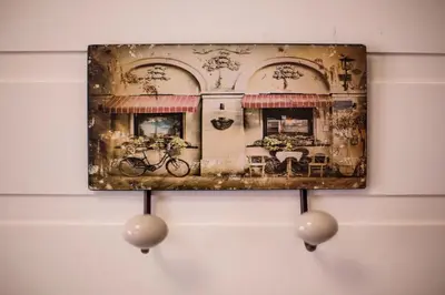 a picture of a house on a wall at Cozy near the sea-Sunset View Apartments in Ixia