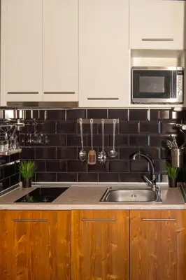a kitchen with a sink and a microwave at Cozy near the sea-Sunset View Apartments in Ixia