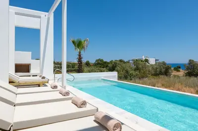 a villa with a swimming pool with a view at Seadream - Luxury Villa - Pool & Sea View in Lachania