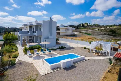 arial view of a villa with a swimming pool at Calm and Joy Summer House in Afantou