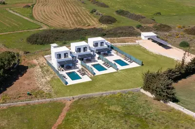 an aerial view of a house with a swimming pool at Elixir Vacation Houses in Gennadi