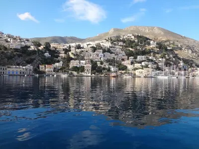 a view of a city from the water at Castello Venetsiana in Symi