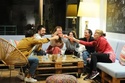 a group of people playing a video game at STAY Rhodes HoStel & Bar in Rhodes Town