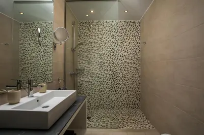 a bathroom with a sink and a shower at Villa Lily in Pefki Rhodes