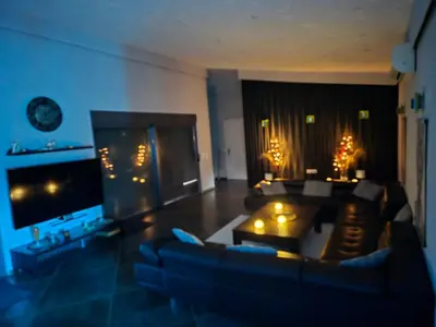 a large living room with a couch and a table at Villa Aurelia Privat Pool in Kolimbia