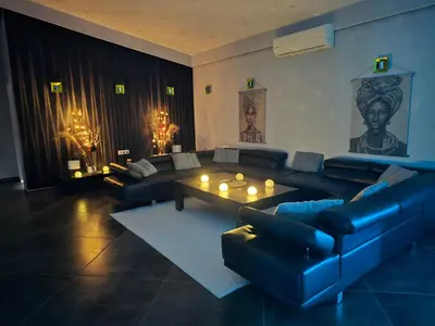 a living room with a couch and a table at Villa Aurelia Privat Pool in Kolimbia