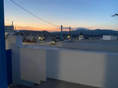 a view of a city from the roof of a building at Athina's house in Archangelos
