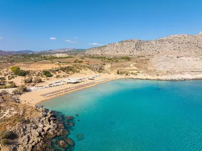 an aerial view of a beach with blue water at Villa 13 Zendo in Kolimbia