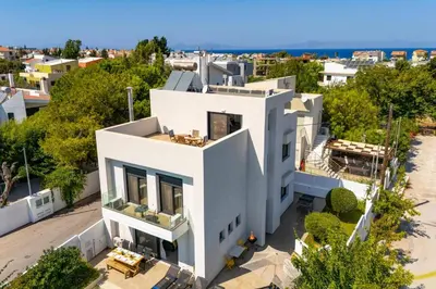 an aerial view of a white house at Villa Thalassa Ixia by Villa Plus in Ialyssos