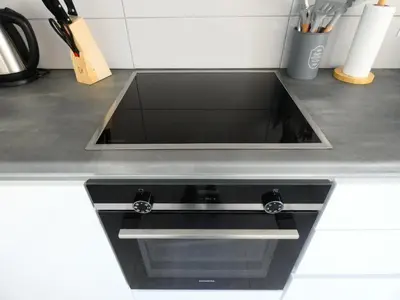 a kitchen counter with a sink in a kitchen at Louloudi Hills Villa 3 in Koskinou