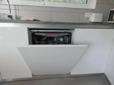 a kitchen with an oven in the middle at Louloudi Hills Villa 3 in Koskinou