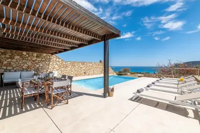 a villa with a swimming pool and a patio at Villa Mare di Levante with Private Pool in Líndos