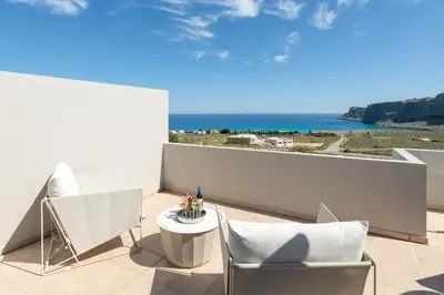 a balcony with a view of the ocean at Villa Mare di Levante with Private Pool in Líndos