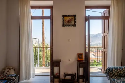 a living room with a view of the eiffel tower at Villa Elizabeth in Symi