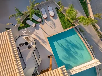 an overhead view of a villa with a swimming pool at Olympus Luxury Villa Rhodes in Koskinou