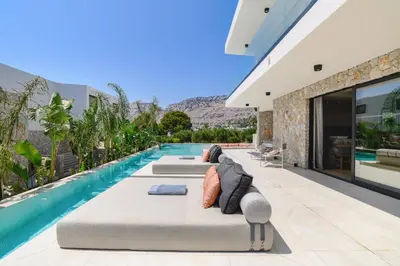 an image of a villa with a swimming pool at Villa Pefkos Sunset by Villa Plus in Pefki Rhodes