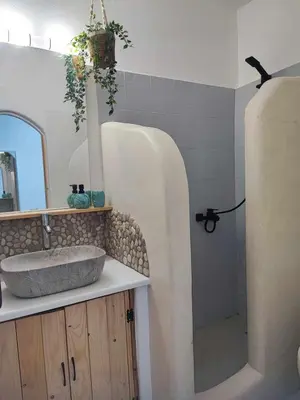 a bathroom with a sink and a shower at Studio Lachania in Lachania