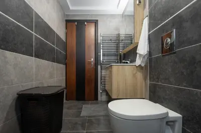 a bathroom with a toilet and a sink at Rhodes Center 2-Bedroom Apartment in Rhodes Town