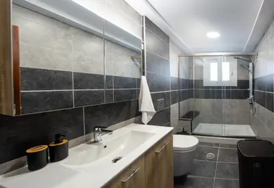 a bathroom with a sink and a toilet at Rhodes Center 2-Bedroom Apartment in Rhodes Town