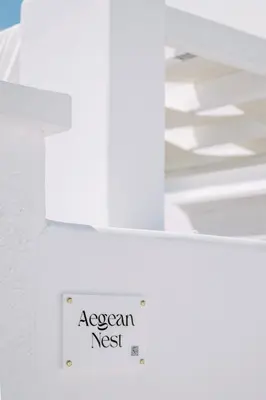 a white refrigerator with a sign that says argonian nest at Aegean Nest in Koskinou