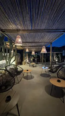 a large room with tables and chairs and lights at LA Casa Di Lusso Casa N8 Adults Only in Kolimbia