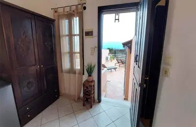 a hallway with a door open to a room with a patio at Saint Michel Collection - Old Town in Rhodes Town