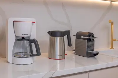 a kitchen counter with a blender and a toaster at Luxury in Simplicity , Nature's Touch , Mezzanine in Rhodes Town
