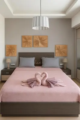 a bedroom with a pink bed with a pink bow on it at Filoxenia City Escape in Rhodes Town