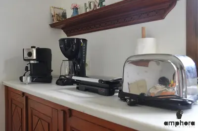 a kitchen counter with a appliance on a counter top at Amphora Sea View Pefkos in Pefki Rhodes