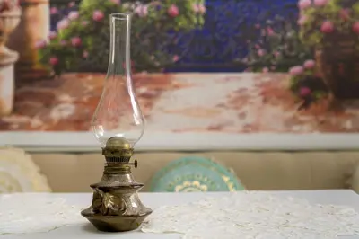 a glass vase sitting on top of a table at Kyramarias Village house in Malona Village