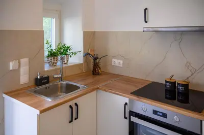 a kitchen with a sink and a counter top at Kiki House in Rhodes Town