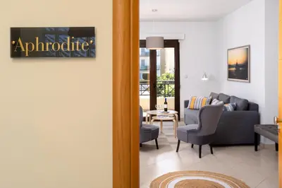 a living room with a couch and chairs and a table at Rodini Anassa in Rhodes Town