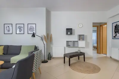 a living room with a couch and a table at Rodini Anassa in Rhodes Town