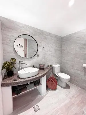 a bathroom with a sink and a toilet and a mirror at LA Casa Di Lusso Casa N1 Adults Only in Kolimbia