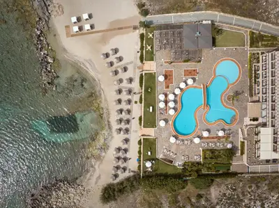 an aerial view of a resort on the beach at Lindian Dream Seaside Resort- Adults Only in Líndos