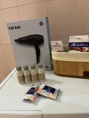 a counter with a knife and four bottles of food at V&G Cozy Home, Pilona Village in vlicha