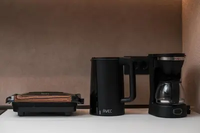 a coffee maker and a coffee pot on a counter at Villa il Borgο in Rhodes Town