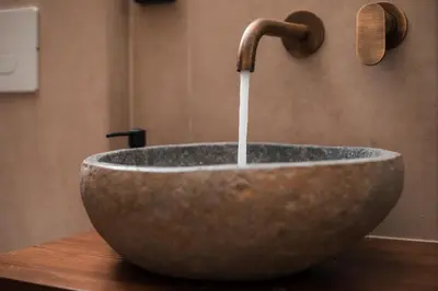 a bathroom sink with a faucet and a sink at Villa il Borgο in Rhodes Town