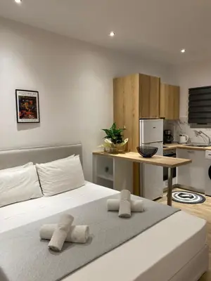 a bedroom with a bed with two pillows on it at Melograno di Rodi 8 in Rhodes Town