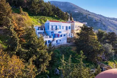 an aerial view of a house on a hill at Lemonitissa Villa in Symi