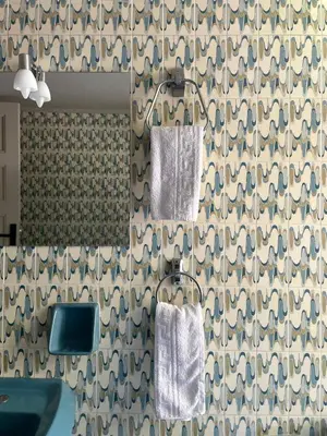 a bathroom with two towels hanging on a wall at Casa Assisi in Rhodes Town